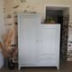 Asymmetrical cabinet