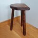 Tripod stool cowherd end of sofa
