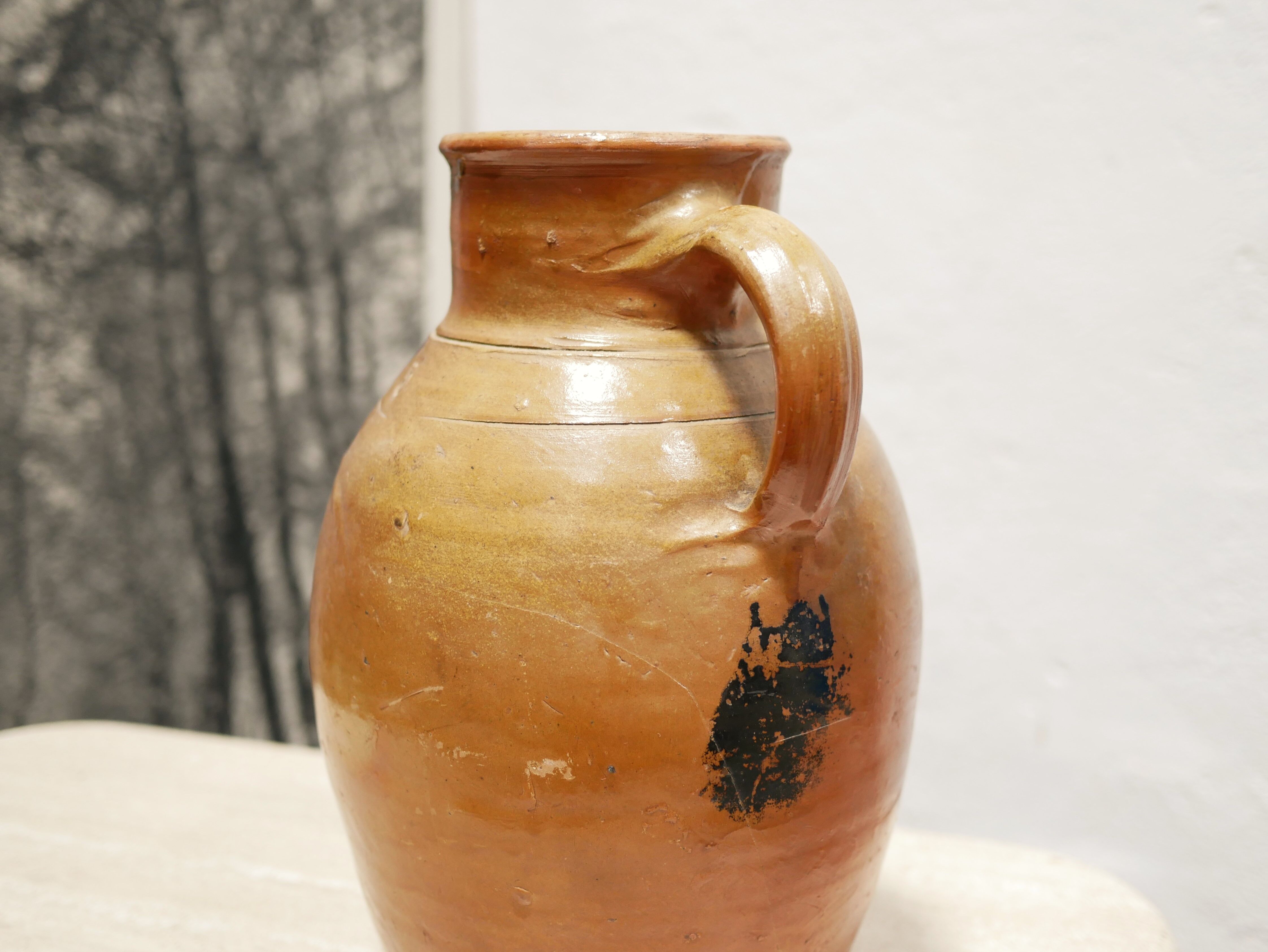 Pot à lait vintage en terre cuite vernissée