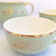 Villeroy cups and pitchers and boch 'We Two' pastel green and gold