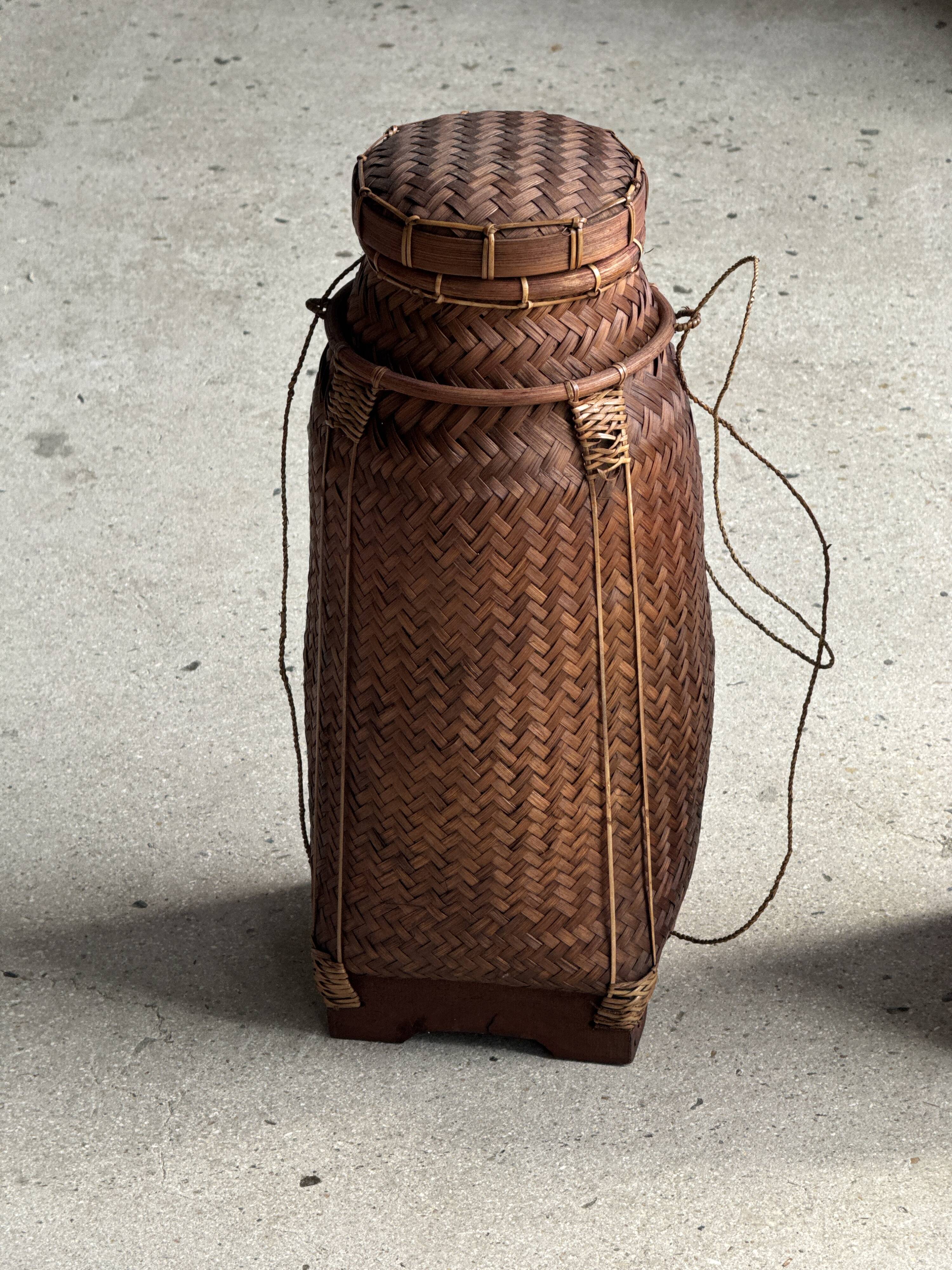 Small traditional Balinese basket with cords H47 D19 0.5kg