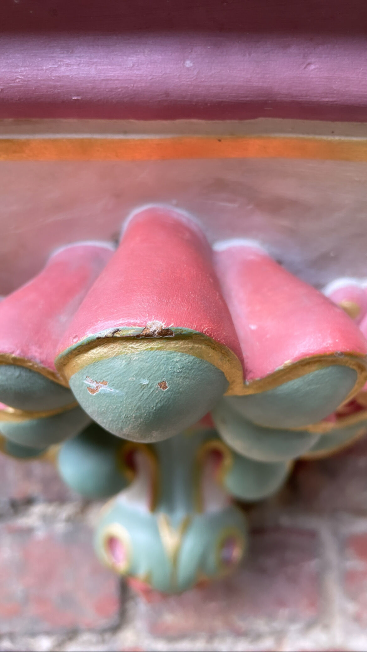 Polychrome plaster wall console