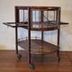 Serving trolley / bar cart in mahogany, brass and glass, 1920