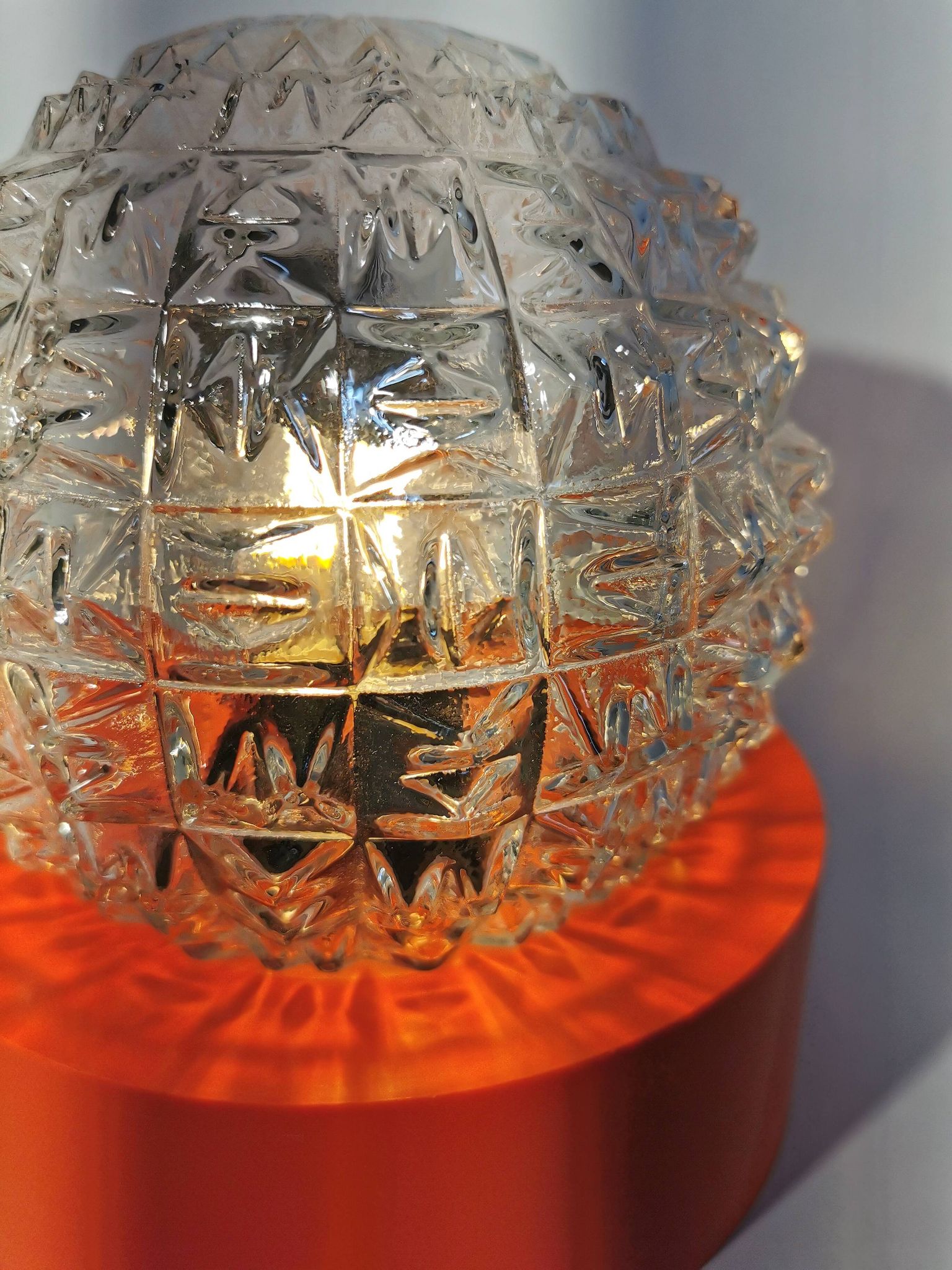 Lampe boule vintage en verre transparent orange