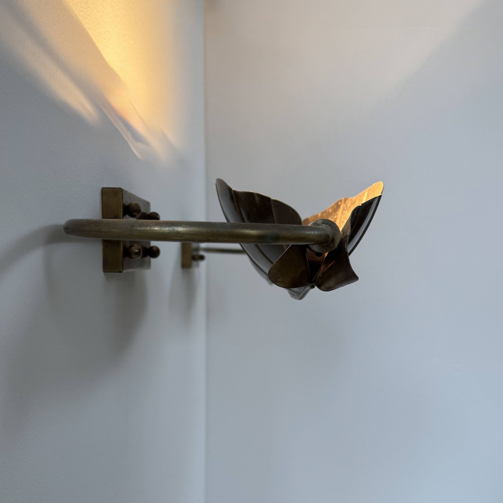 Pair of vintage wall lights, patinated brass, France, 1970.