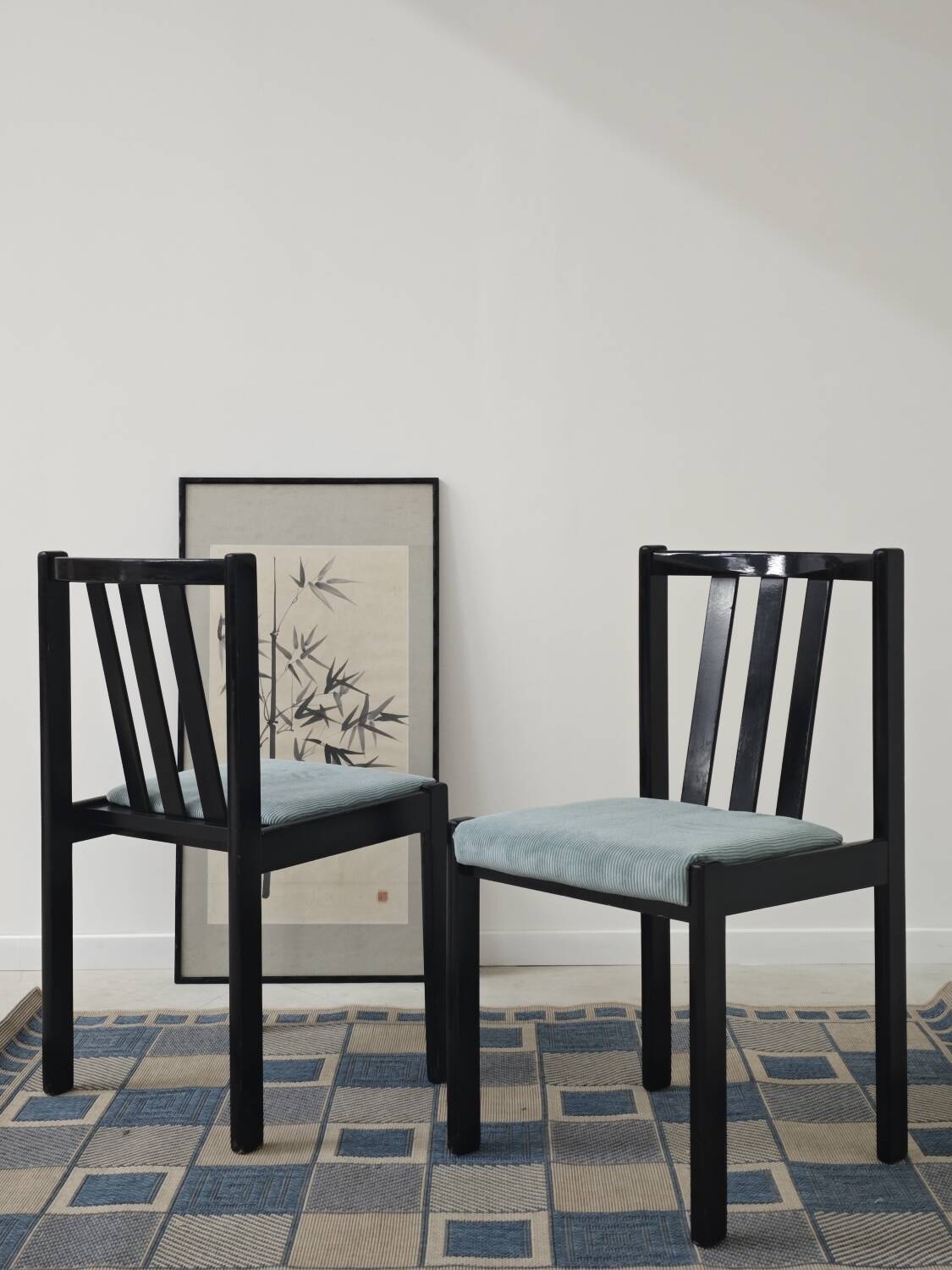 Set of 4 modernist black chairs with light blue ribbed fabric