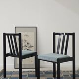 Set of 4 modernist black chairs with light blue ribbed fabric