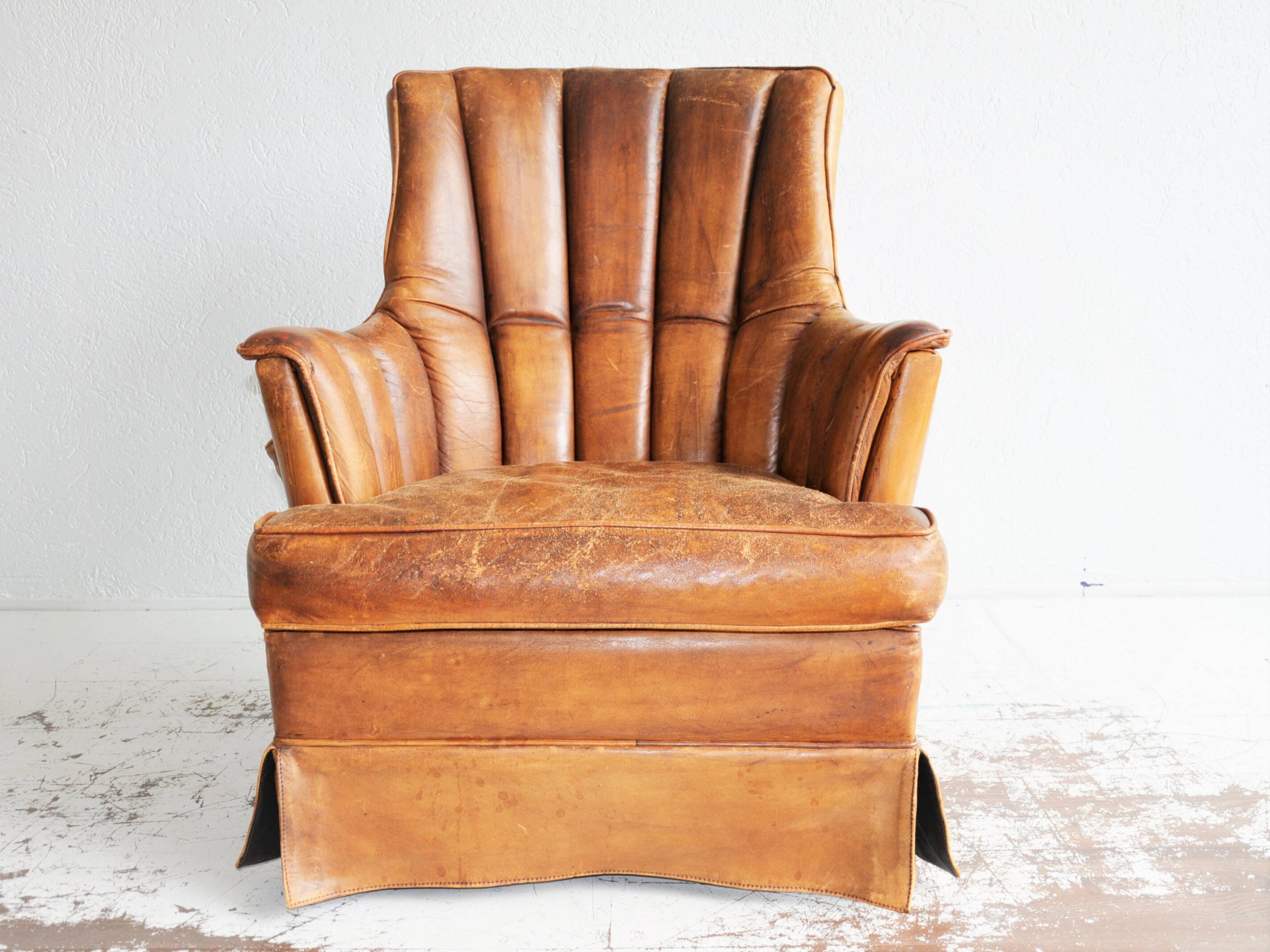 Vintage sheap leather armchair,  large smoker chair in brown sheapleather, Big leather fauteuil