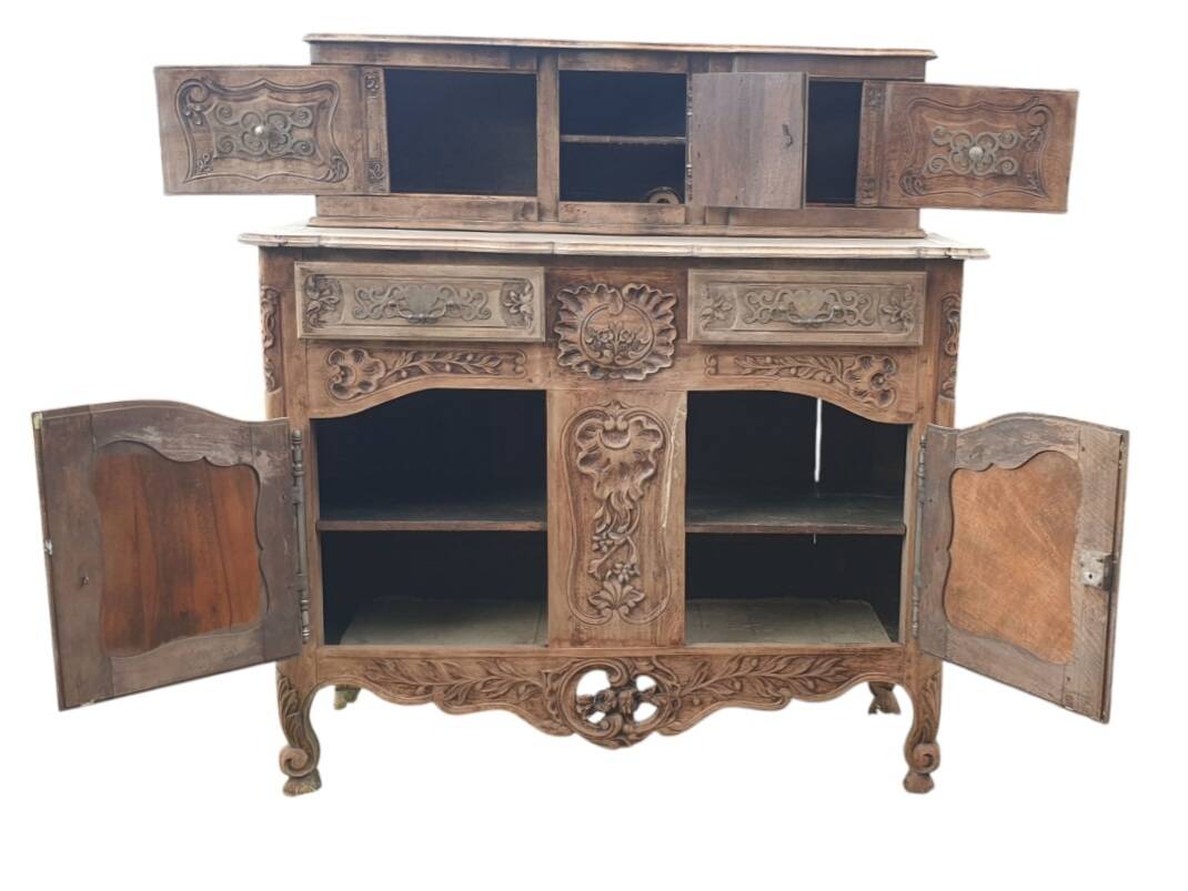Provencal furniture in finely carved light walnut with wrought ironwork