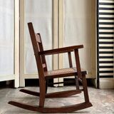 Children's rocking chair in dark wood and cane