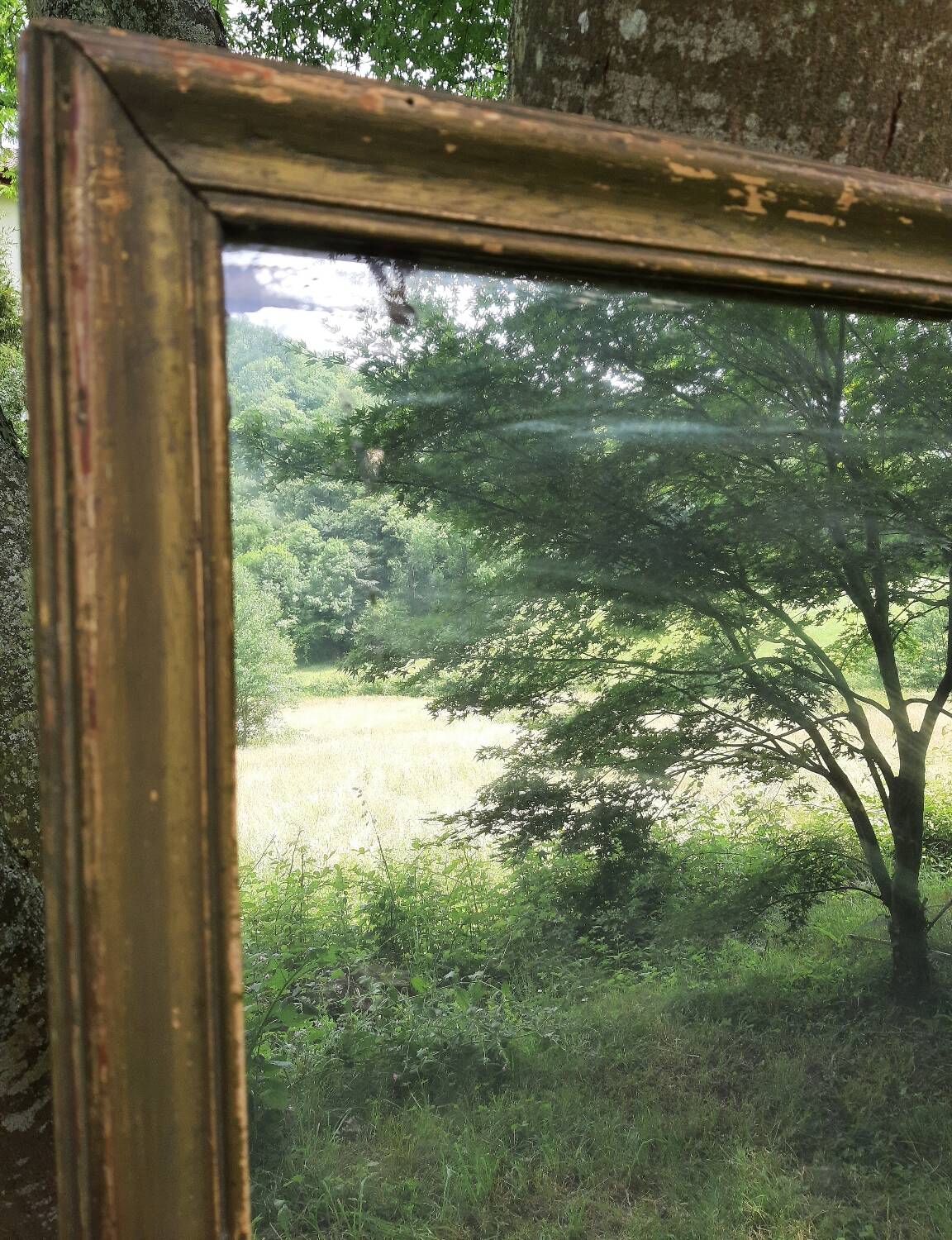 Antique mercury mirror. (Fireplace mirror)