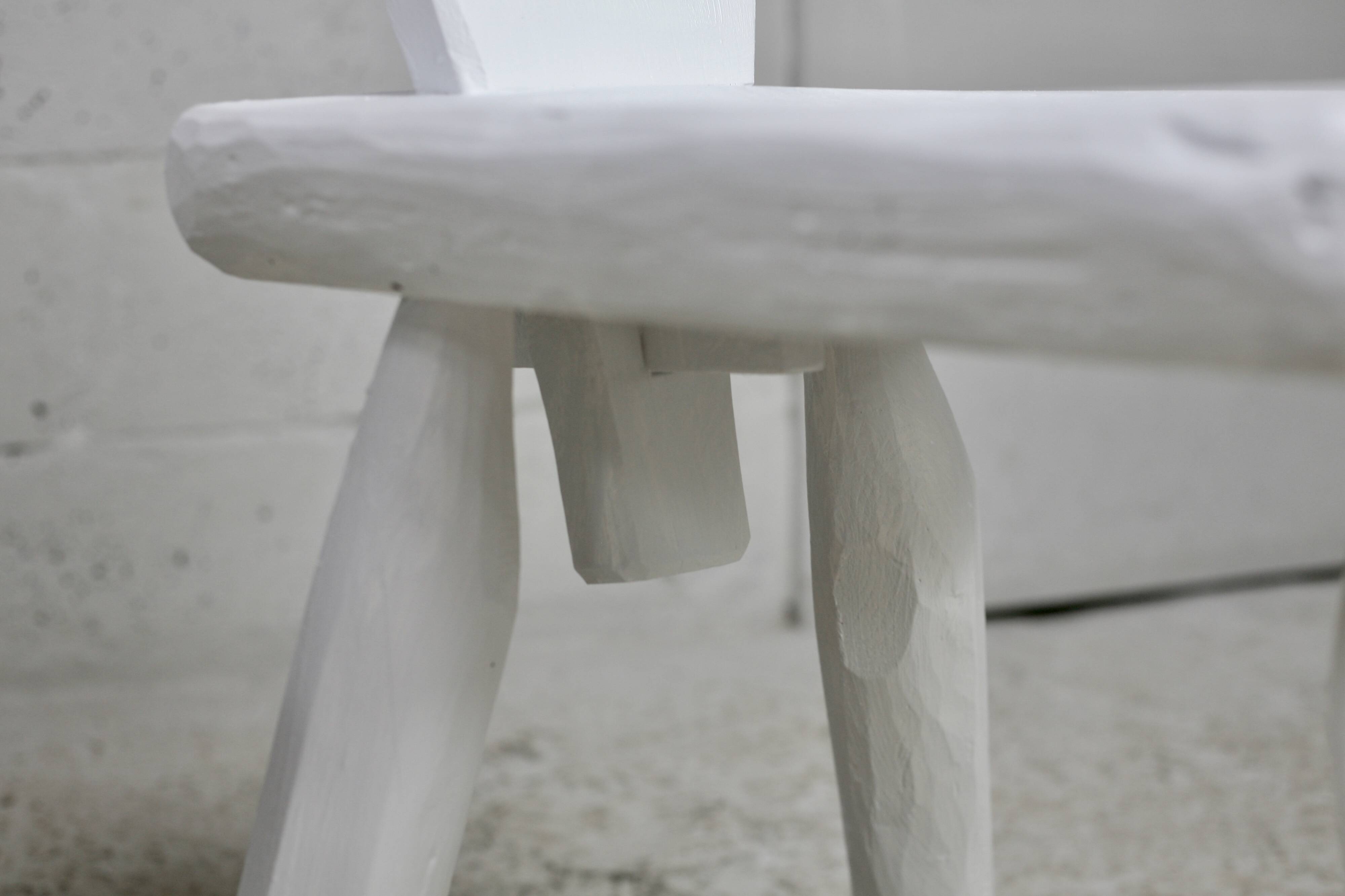 Pair of tripod chairs, gouged seats. Brutalist, circa 1960. Painted wood.