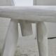 Pair of tripod chairs, gouged seats. Brutalist, circa 1960. Painted wood.