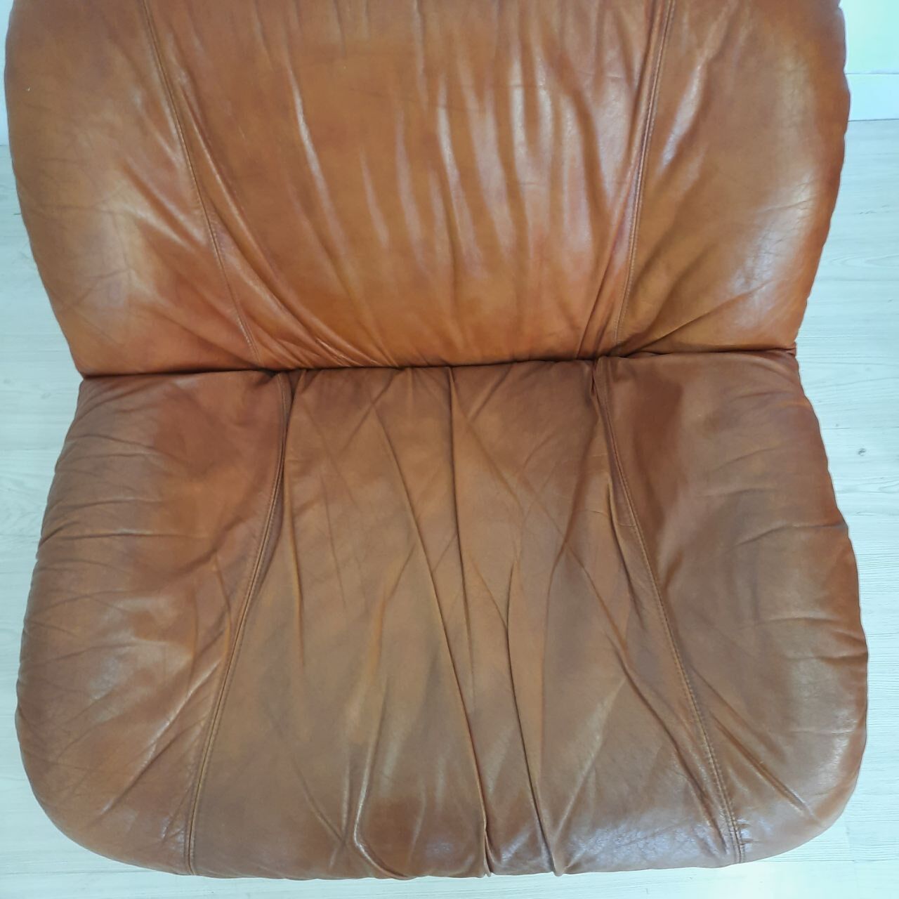 Four vintage armchairs, leather and fabric, 70s