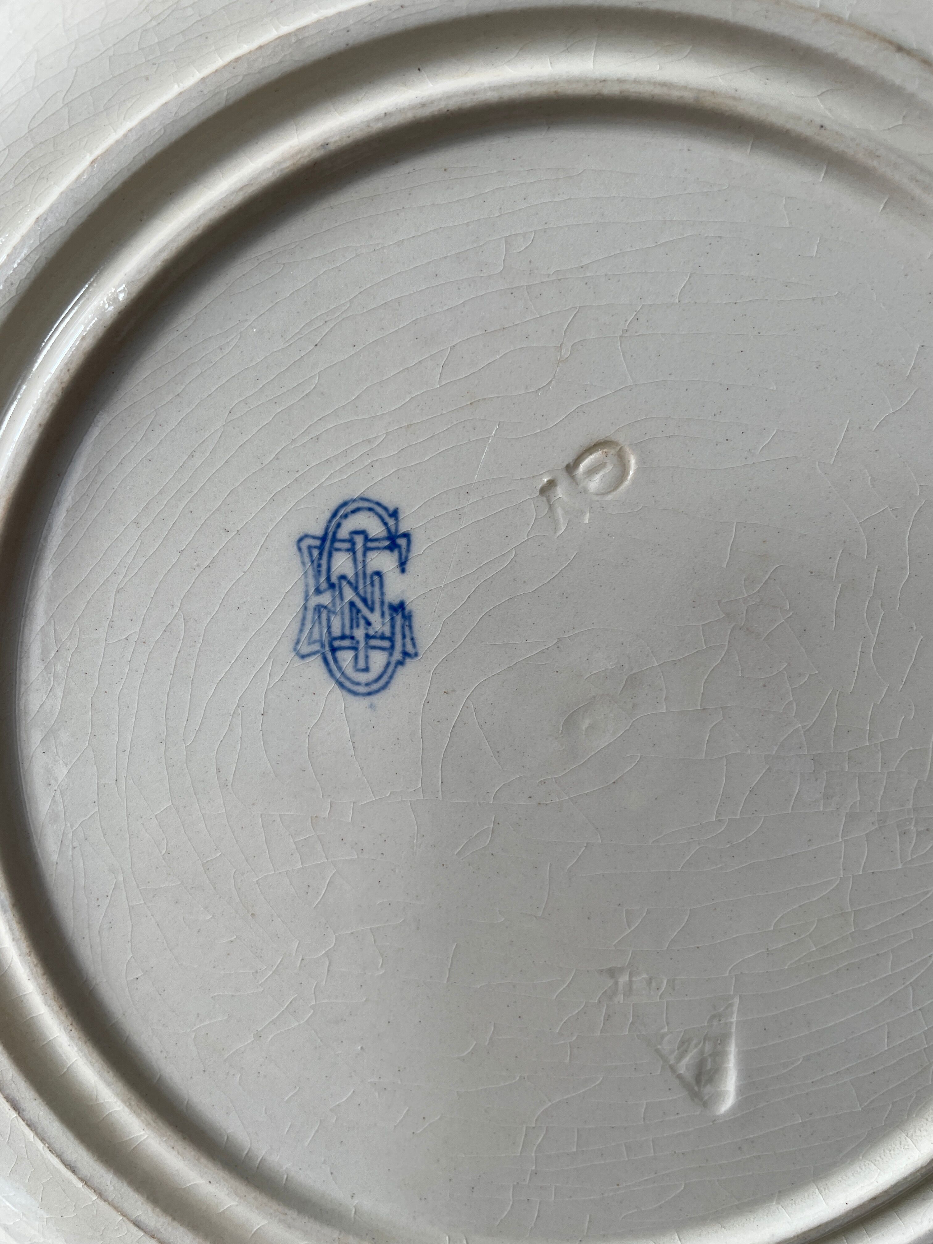 Set of 8 nineteenth century earthenware plates from Gien