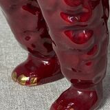 Burgundy and gold ceramic dog