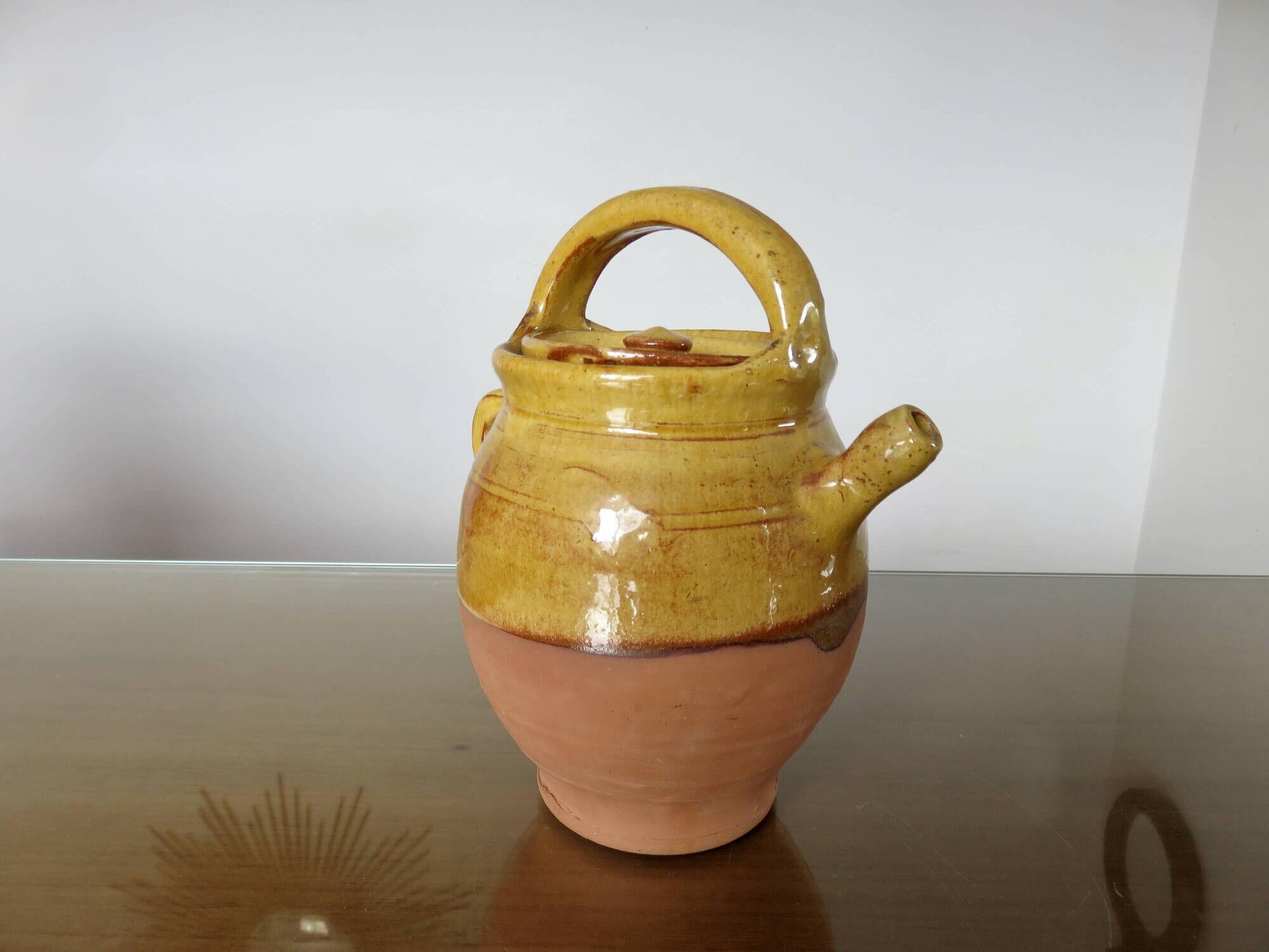 Glazed yellow terracotta jug, south-west of France.