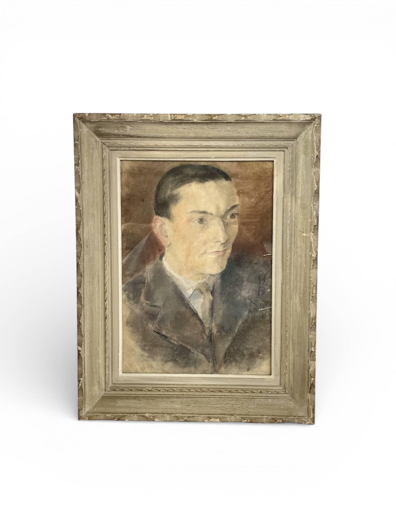 Portrait of a man in pastel under glass, signed, early 20th century.