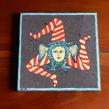 Lava stone tile representing La Trinacrie