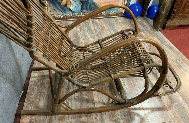 Rocking chair in curved wood and wicker