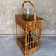 Vintage wicker bottle rack