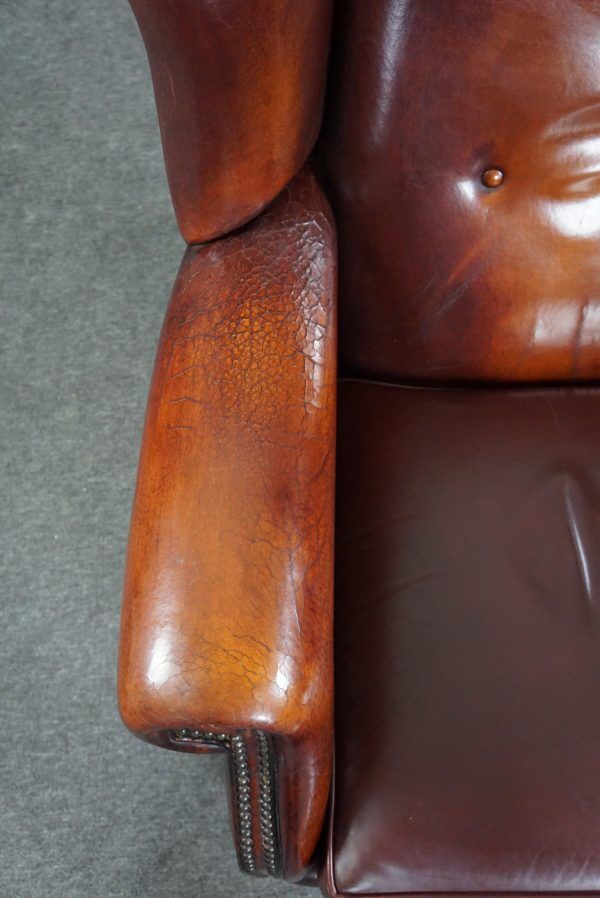 Patinated sheepskin armchair