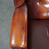 Patinated sheepskin armchair