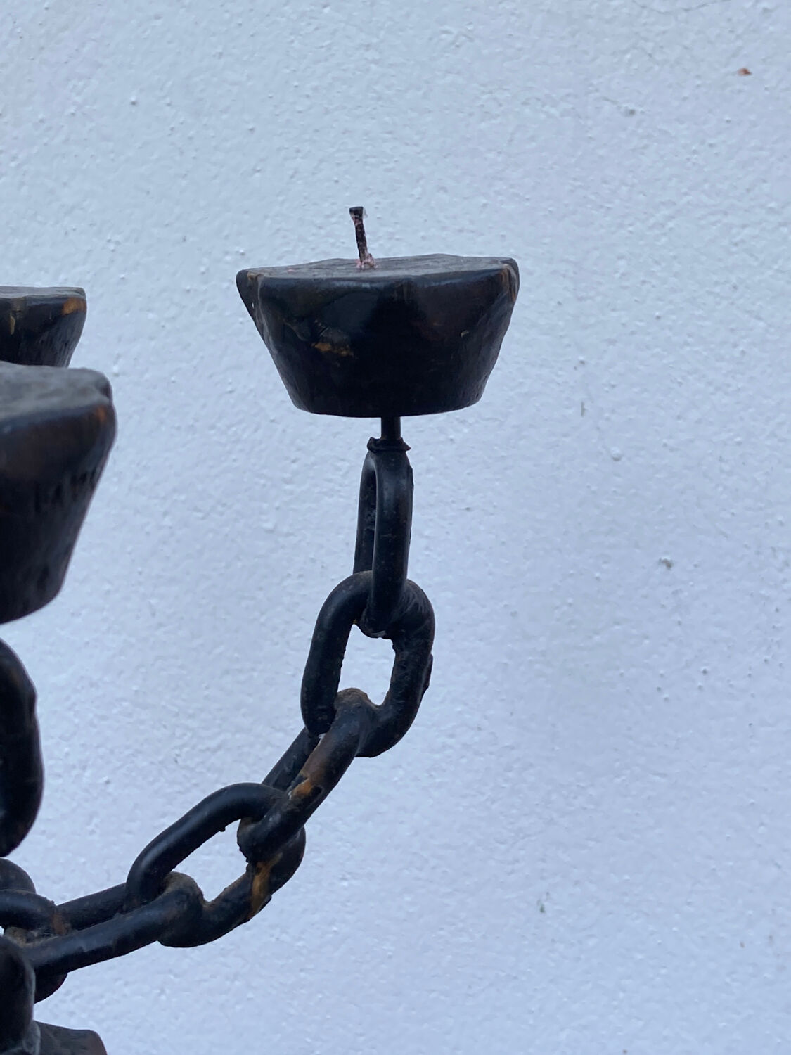 Brutalist iron and wood chain candle holder from the 1970s