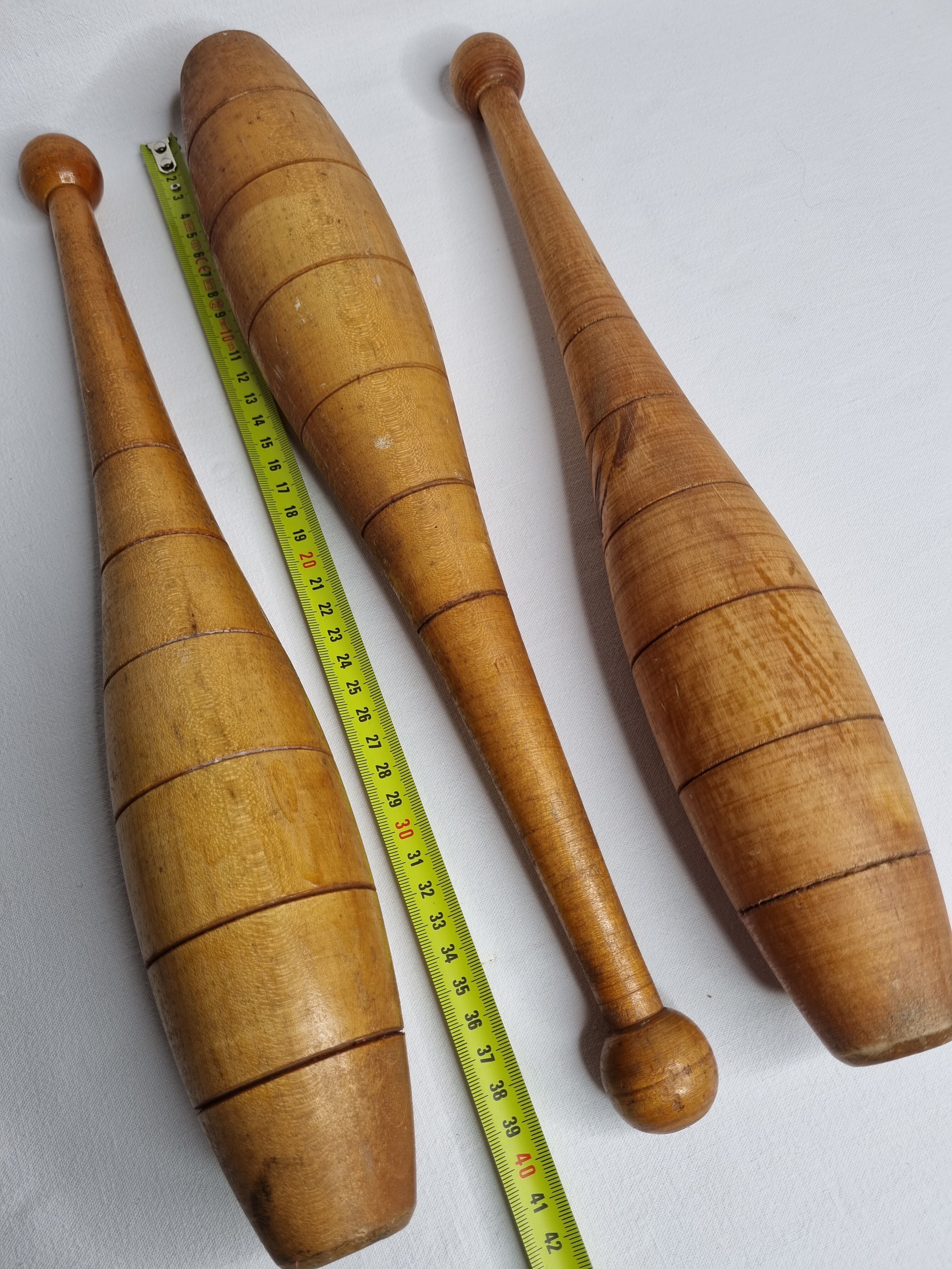 Set of three vintage juggling clubs in turned wood