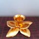 Brass flower candlesticks, 1970.