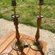 Two brass bedside lamps