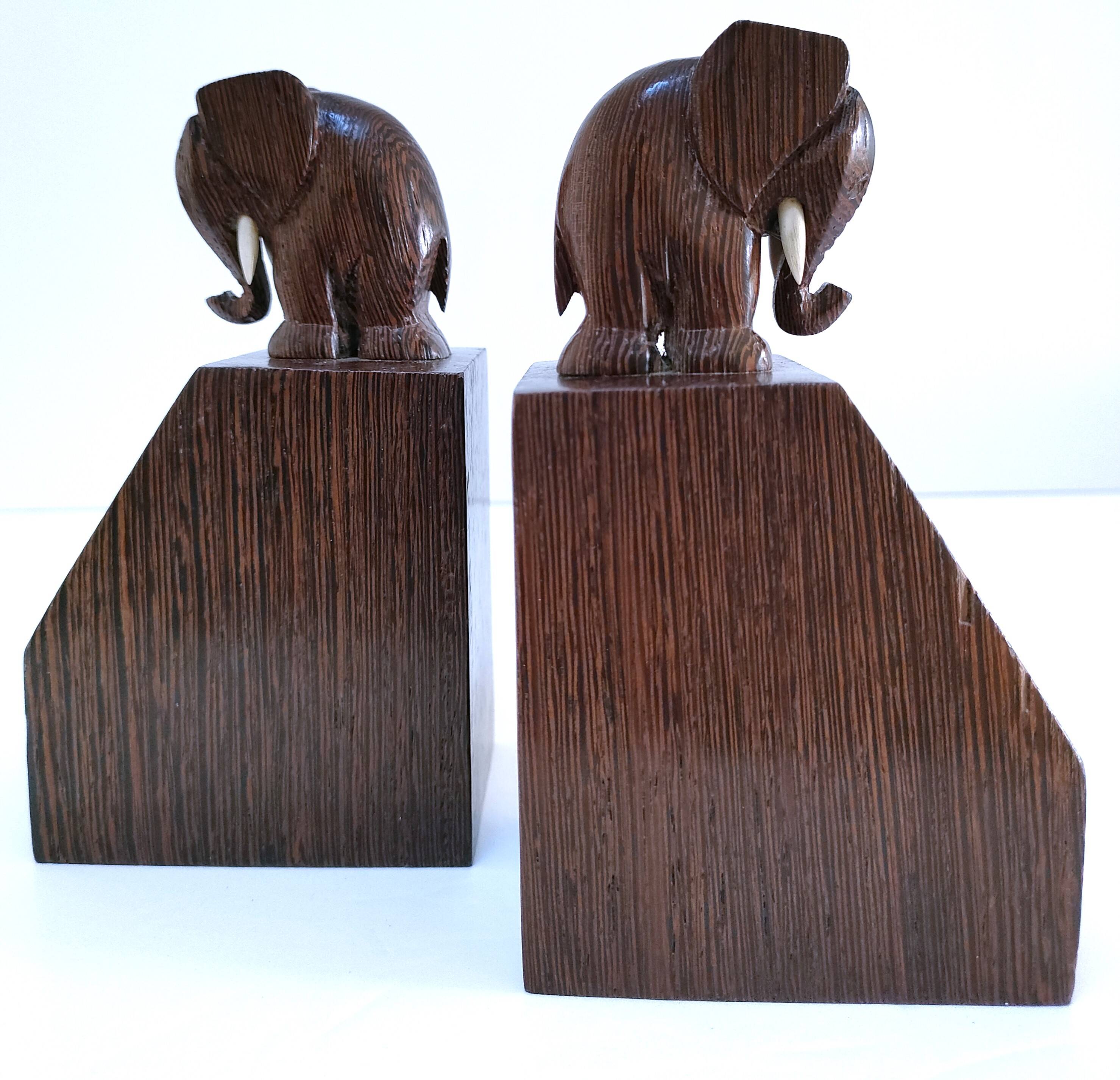 Pair of stylized elephant bookends in solid wood