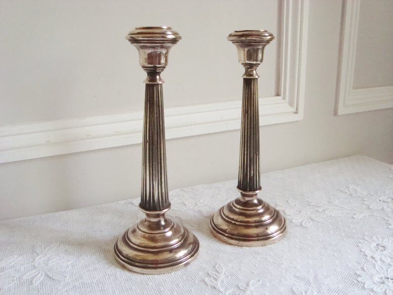 Pair of very old brass candlesticks