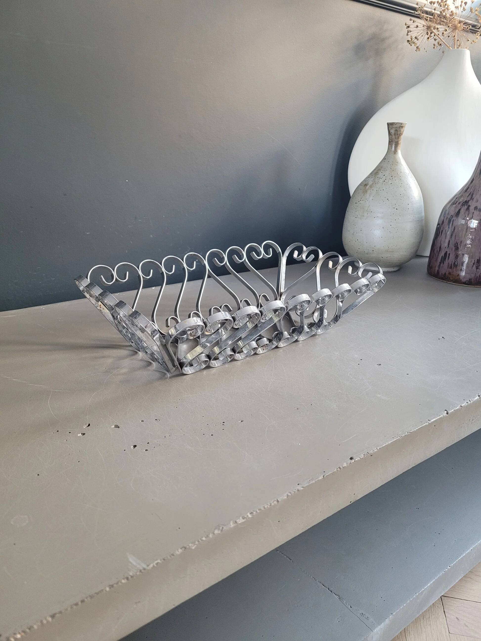 Vintage bread basket in forged chrome-plated metal
