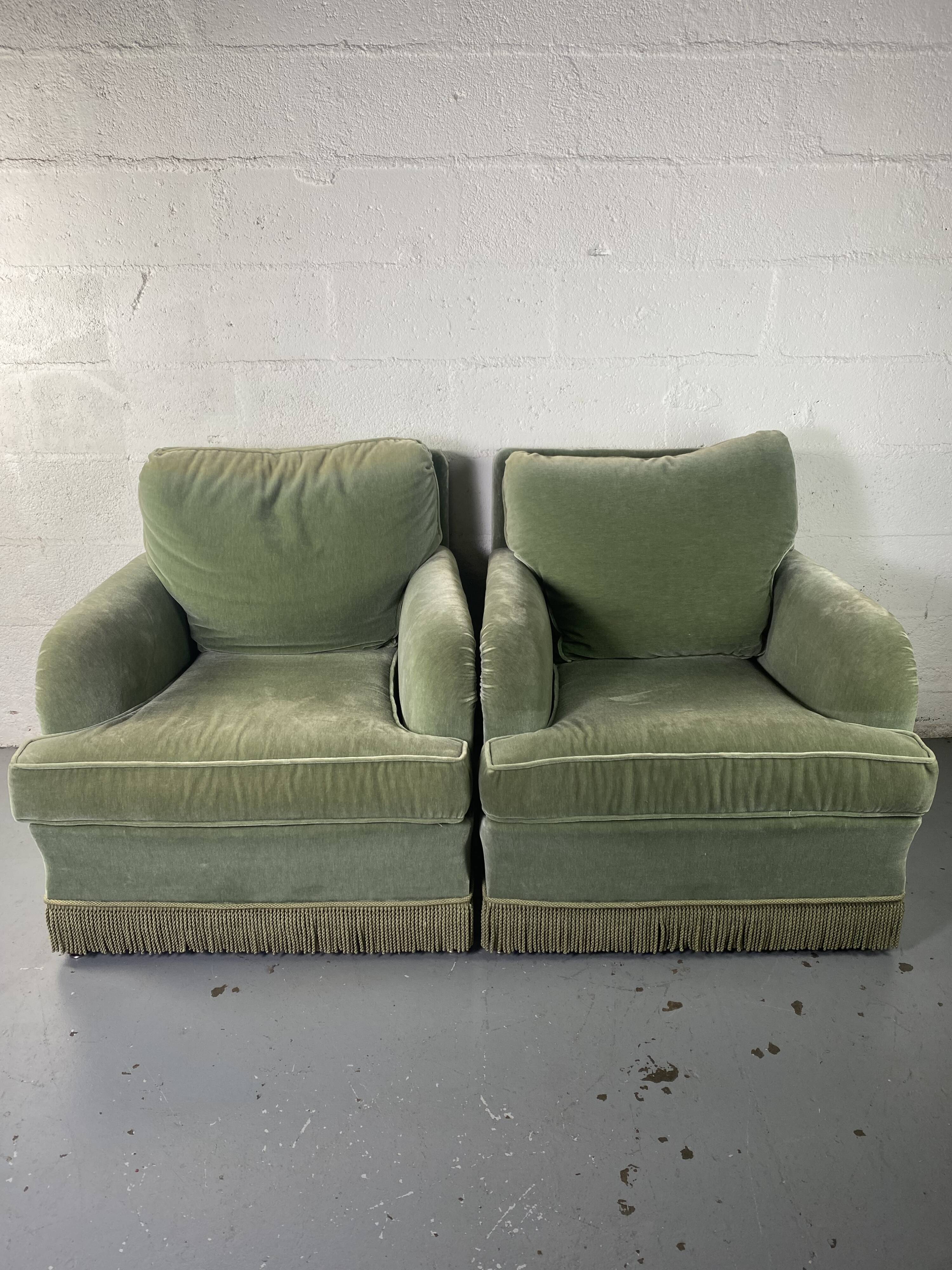 Pair of green velvet club armchairs