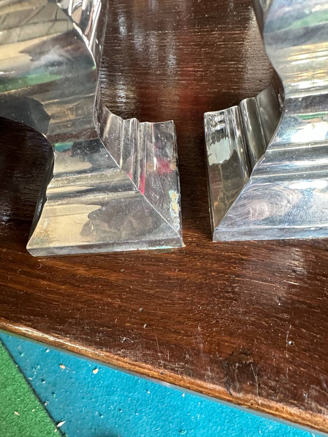 Pair of silver-plated metal candlesticks