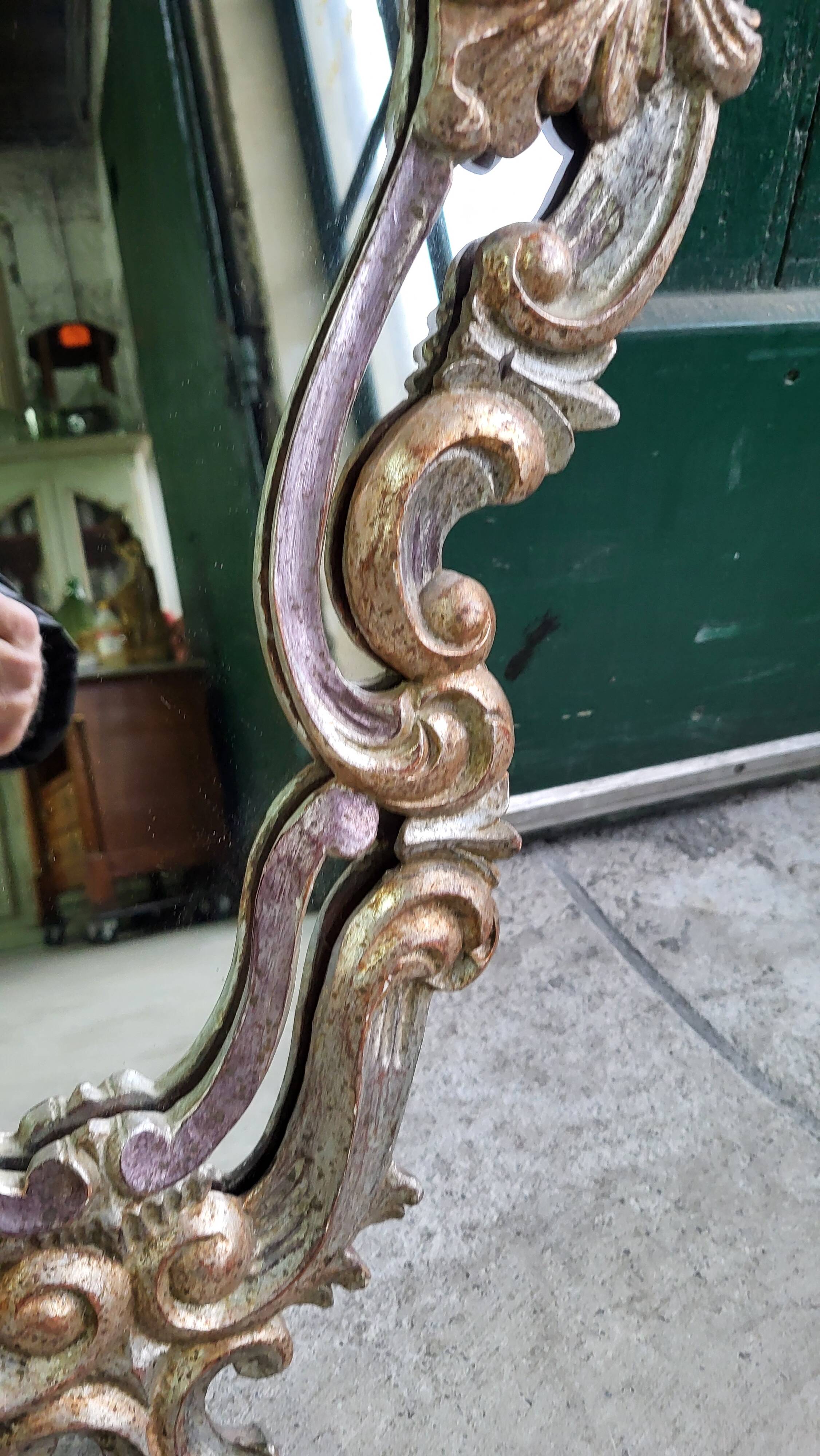 MIRROR IN LOUIS XV STYLE WITH GILDING AND SILVERING