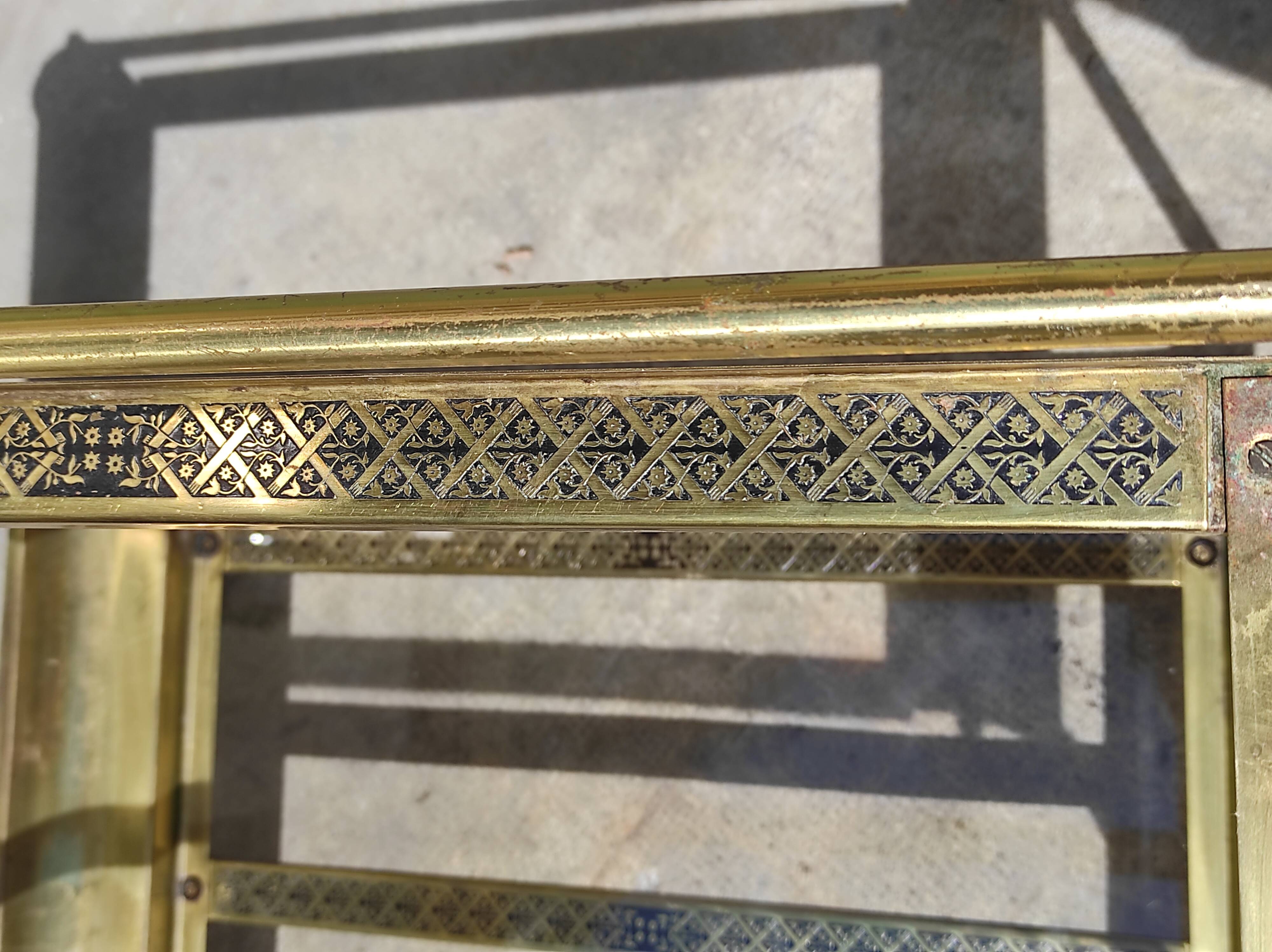 Old rolling coffee table serving vintage brass bar 50s mid-century design