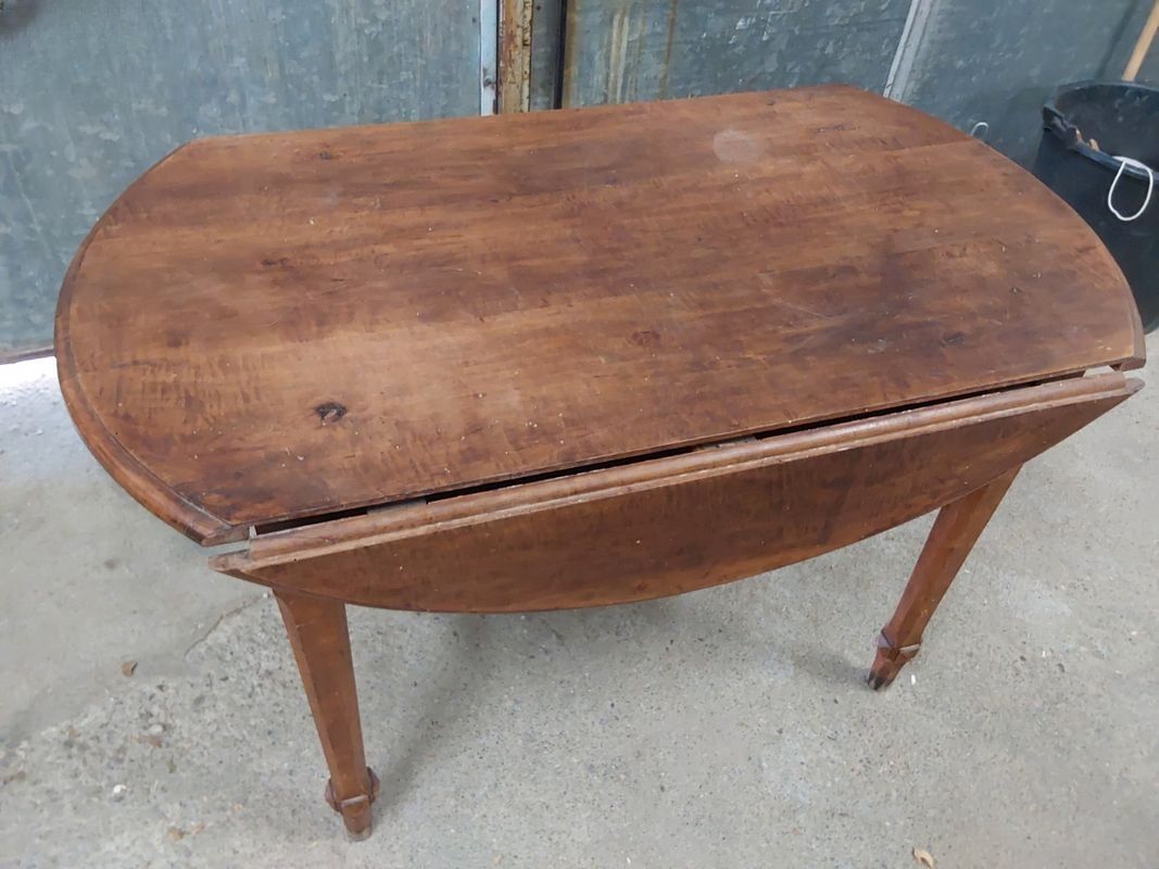 Antique wooden drop-leaf table