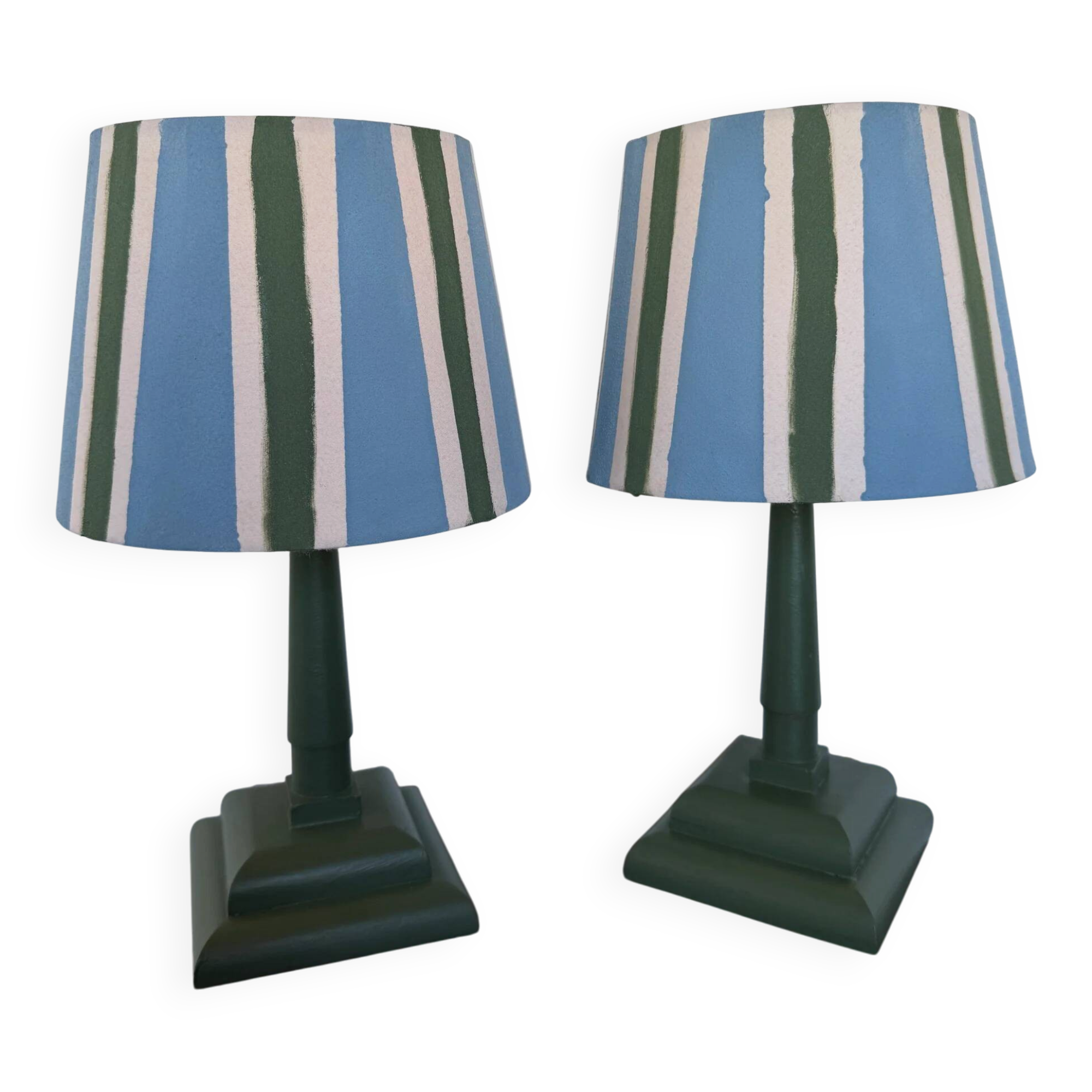 Pair of vintage wooden lamps with their striped beige, blue, and green shades.