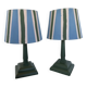 Pair of vintage wooden lamps with their striped beige, blue, and green shades.