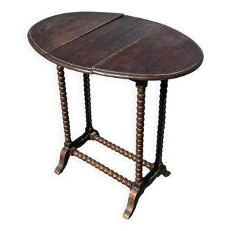 Small folding table called Gateleg, Victorian era
