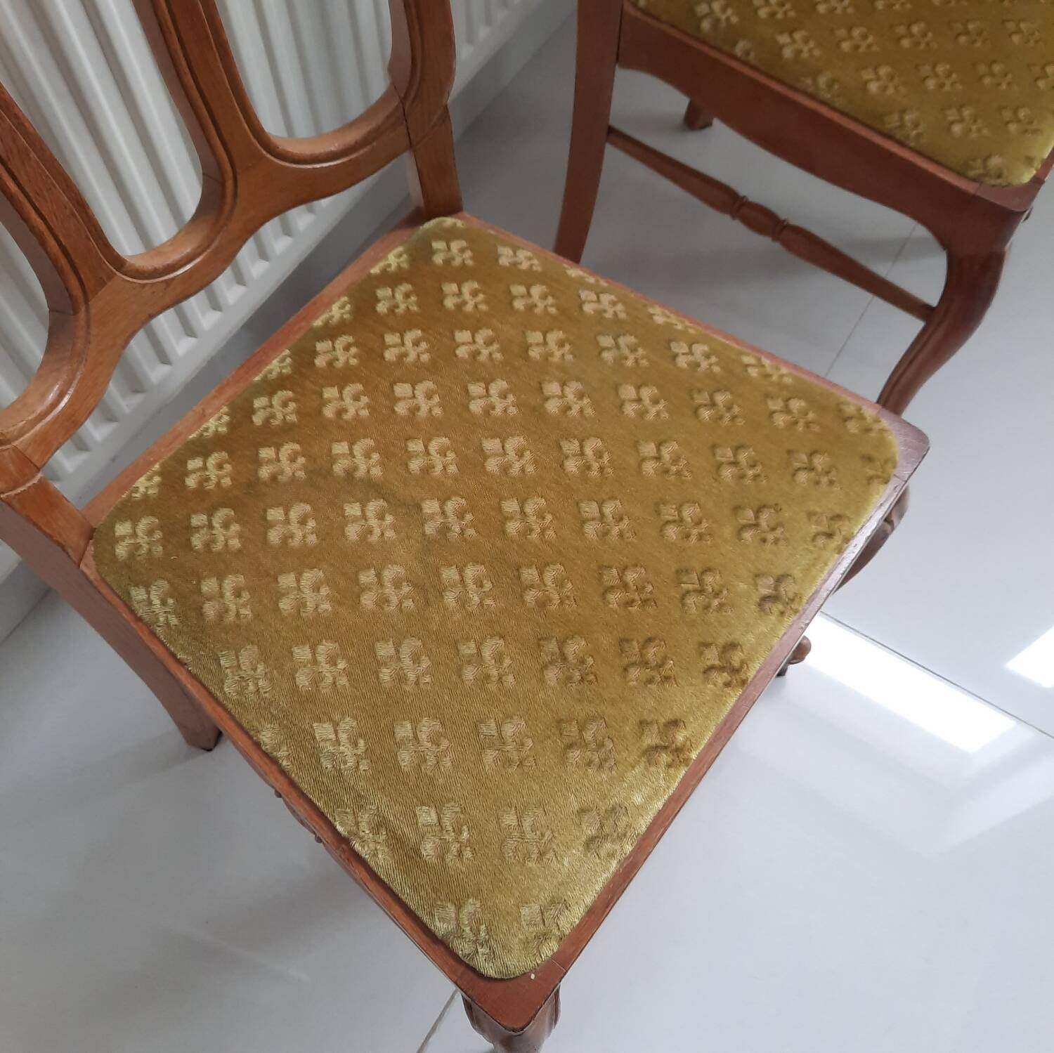 Louis XV style chairs with Fleur de Lys seats