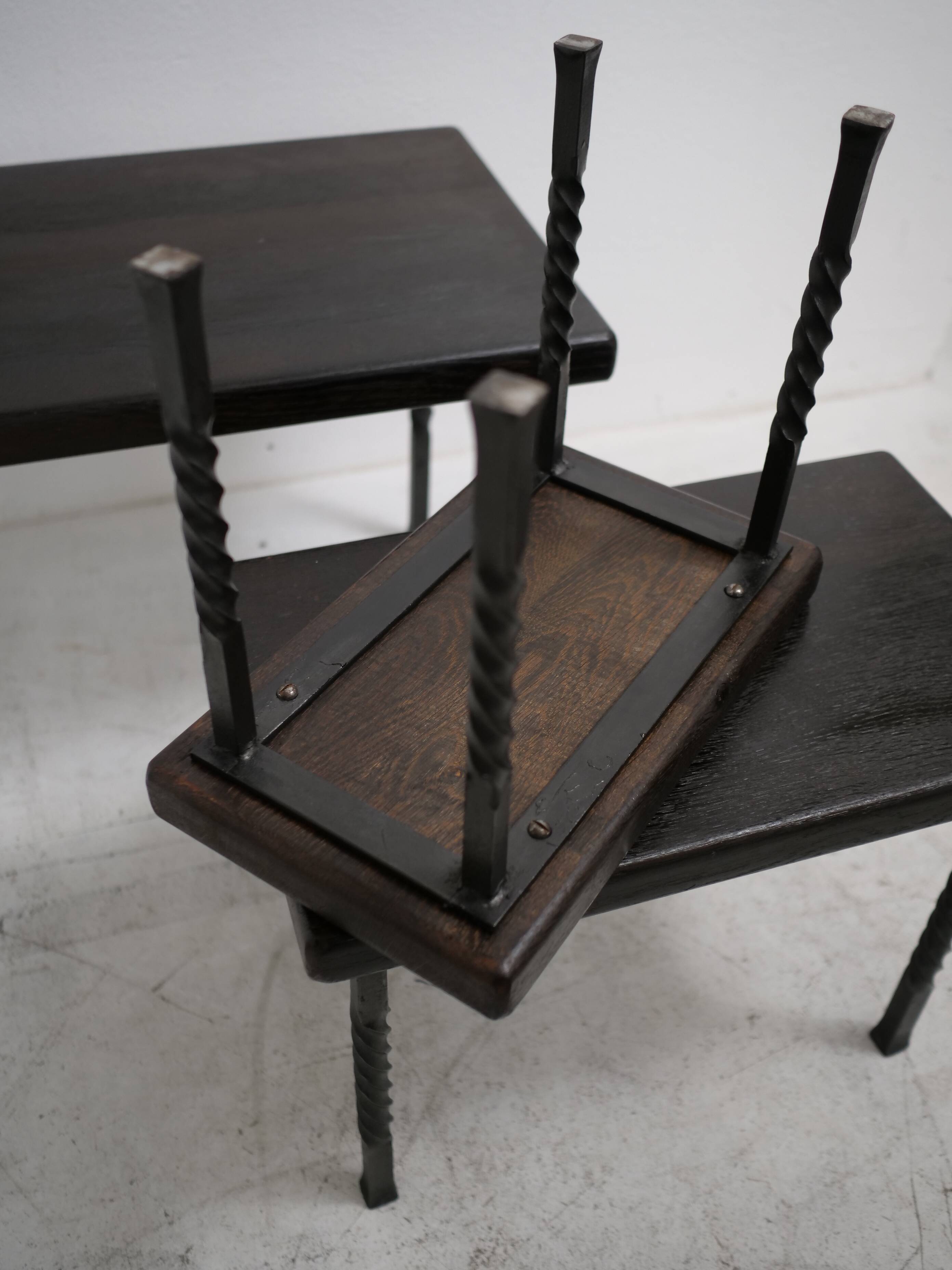 Brutalist nesting table in ebonized oak and wrought iron