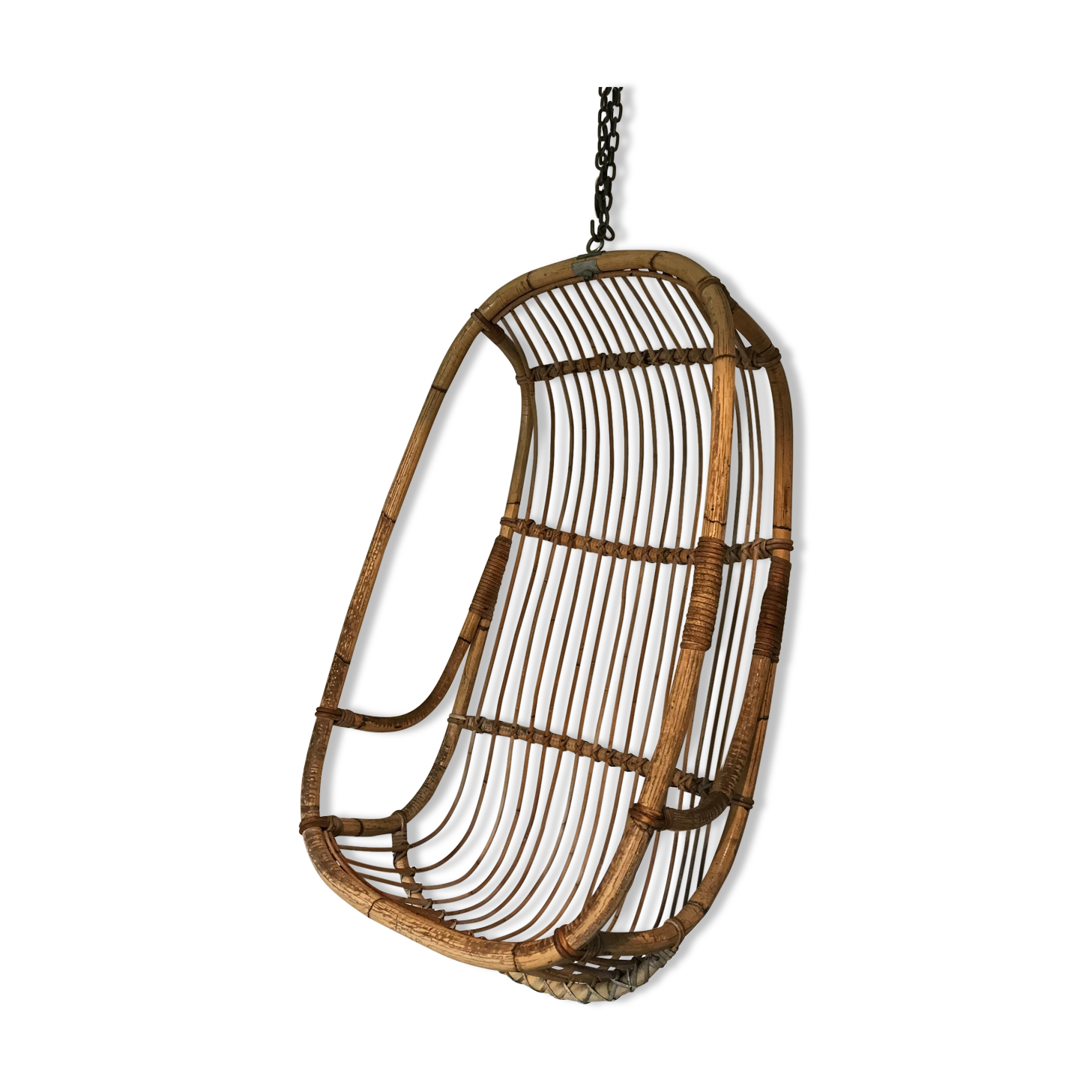 Vintage chair suspended in rattan