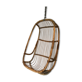 Vintage chair suspended in rattan