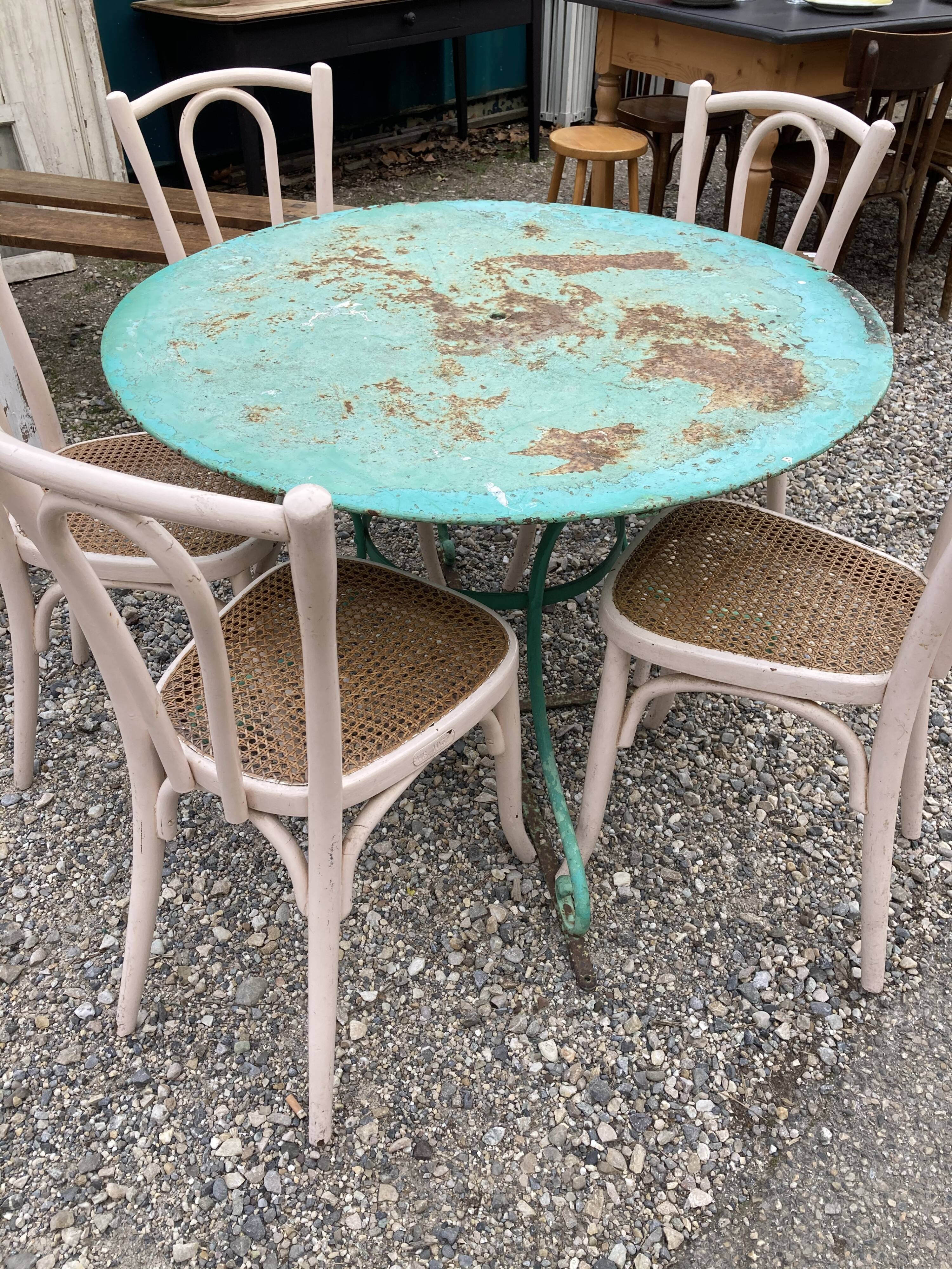 Green wrought iron garden table