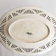 Oval dish in openwork earthenware from Sarreguemines, blue ribbon and fruit