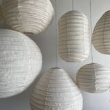 Suspension in rattan and natural japanese linen in the shape of a drop