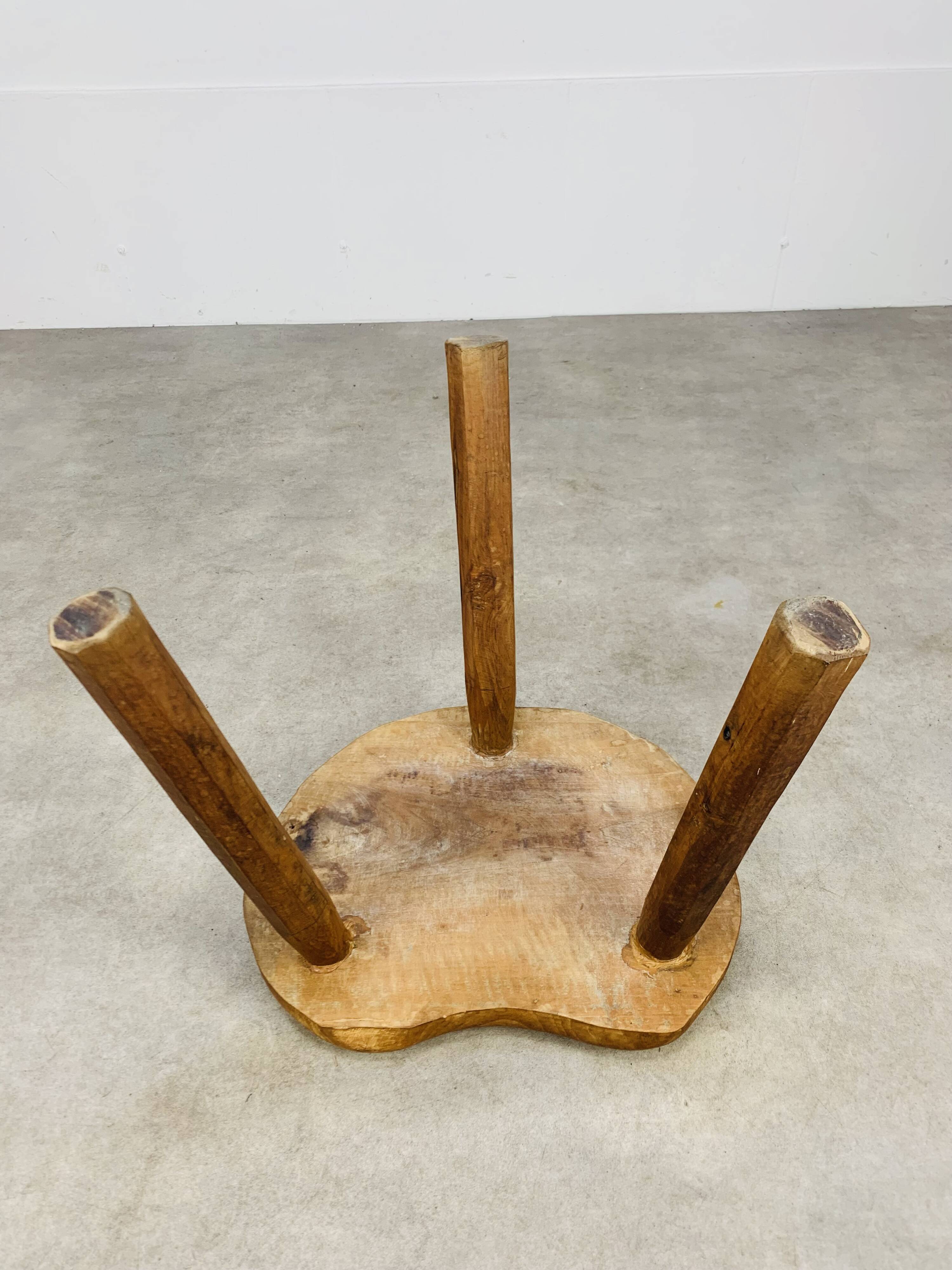 Brutalist tripod stool in solid wood